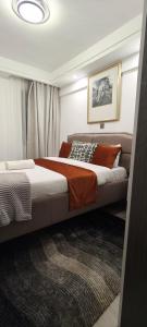 The modern executive serene suites with amazing breathtaking city views ,fully equipped gym , swimming pool and private ample parking space