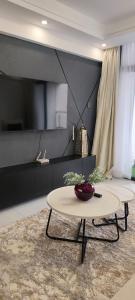 The modern executive serene suites with amazing breathtaking city views ,fully equipped gym , swimming pool and private ample parking space