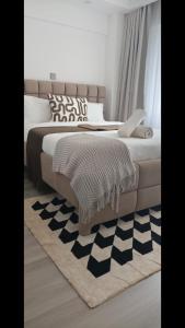 The modern executive serene suites with amazing breathtaking city views ,fully equipped gym , swimming pool and private ample parking space