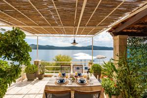 Apartments Ratac Lobrović with private beach and beautiful sunset