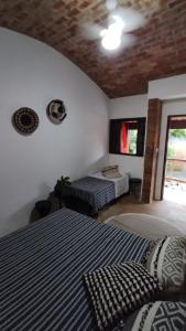 Linda casa com piscina e churrasqueira PM122