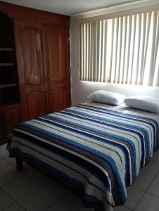 3 camas matrimnoniales, baño, Clima,Wifi, G Estacionamiento,Independiente