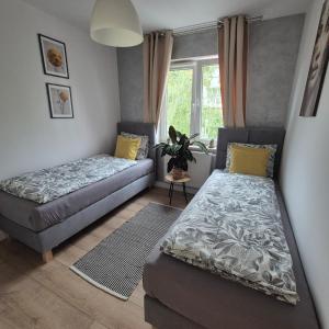 Komfortowy Apartament z Dwiema Sypialniami
