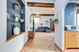 Terracotta & Wooden Beams Style in Historic Center of Rome