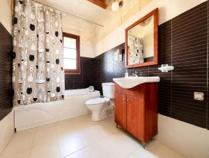 Two Connected Farmhouses in Gharb Gozo with 2 Private Pools Rooftops and BBQ Sleeps 16