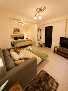Apartamento Boutique frente a plaza principal