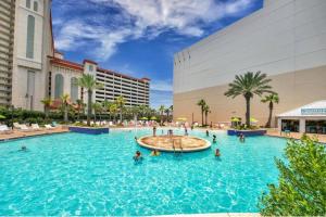 Gulf-View Resort Condo with 5 Pools! Walk to Beach by Dolce Vita Getaways
