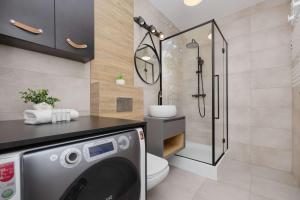 Warsaw Cozy Apartment with Parking and Garden by Noclegi Renters