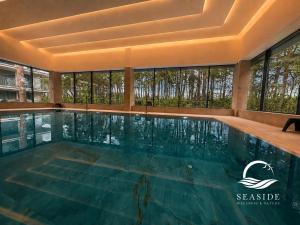 Seaside Wellness & Nature - Premium Beachfront Apartment