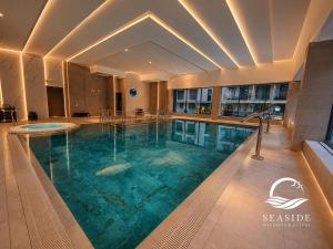 Seaside Wellness & Nature - Premium Beachfront Apartment