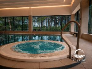 Seaside Wellness & Nature - Premium Beachfront Apartment