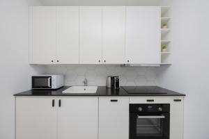 Cozy Apartment with Parking Near EXPO XXI by Noclegi Renters