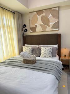 Estebellas Crib at Aurora Escalades Condominium