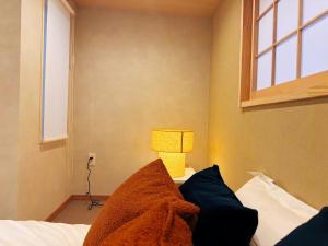 OM HigashiHira Tanimachi 9-chome station 7-minute walk Japanese-style inn 2 train stops to Namba