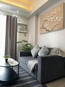 A minimalist and spacious 1Br condo at Amani Grand Resort Residences Mactan near MCIA