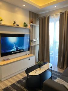 A minimalist and spacious 1Br condo at Amani Grand Resort Residences Mactan near MCIA