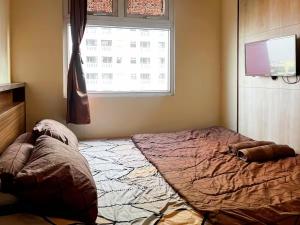 2BR Apt Green Pramuka with Pool & Wi-Fi by 2ndHome