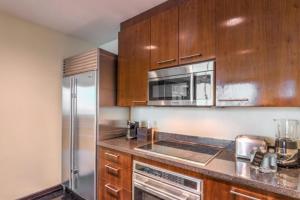 Two Bedroom Penthouse with Mountain and City Views