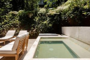 Casa entre los árboles con jacuzzi en Cerro Gordo