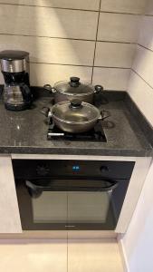 Trinity Towers Apartment Near CIT with Pool and Gym