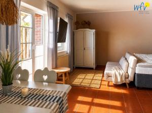 Ferienhaus am Gutspark Drankse Ferienwohnung Sonnengarten