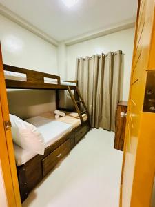 Lane 2 - 2BR Fully airconditioned Apartelle near Wilcon and Robinsons