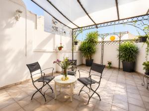 Propiedad Premium de 4 Dormitorios con Terrazas Privadas en Gran Via Valencia-AC, Wifi, Ubicación Perfecta