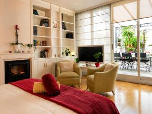 Propiedad Premium de 4 Dormitorios con Terrazas Privadas en Gran Via Valencia-AC, Wifi, Ubicación Perfecta
