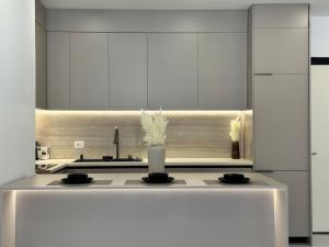 Beachfront Modern 1BR Sunset Sea View Ilyonis Residence