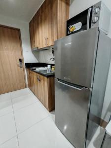 Shore3 Tower2 City View 1BR parking MOA Airport by Shmily Suite Staycation