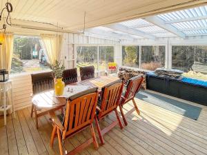 8 person holiday home in HENÅN