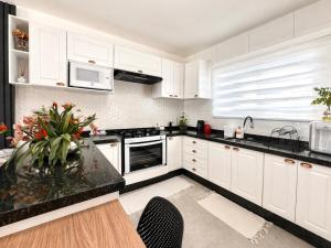 Casa com 2 quartos, estacionamento e ar-condicionado
