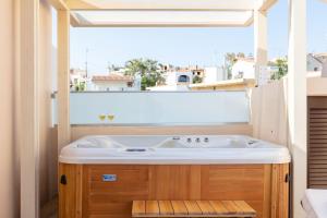 Beachfront Penelope Home with Private Jacuzzi, BBQ & Playground, Walk to Everything