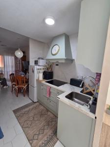 Benalbeach Beauty- Sunny studio with ocean views, balcony, and windows in every room
