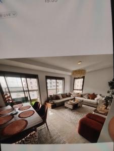 Apprt à louer à zenata de 3 chamb et salon avec une belle terrasse vu sur piscine et balcon vu sur jardin dans une résidence fermée avec piscine