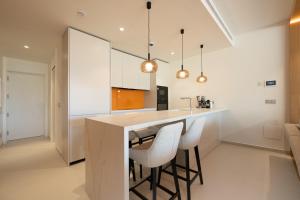 Luxury 2-Bedroom Apartment with Panoramic Sea Views in Reserva del Higuerón