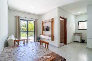 Apto c Varanda e Churrasq. nos Ingleses SJS0010
