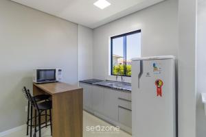 Apto c garagem 400m das Dunas Ingleses SLC0203