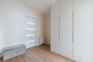 Grunwald Homely Apartment by BookingHost
