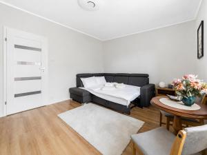 Grunwald Homely Apartment by BookingHost