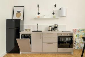Bright Poznan Studio near the Zoo and MTP by Noclegi Renters