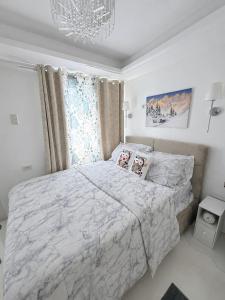 Snuggles Nest Tanza Condo