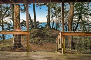 Adventure Awaits at this Oceanfront Cabin with Stunning Views and Beach Access