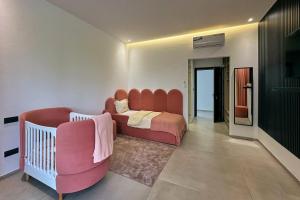 Villa Maha - Piscine Chauffée, Padel, Spa, Jaccuzi et Salle de Sport - Marrakech