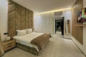 Villa Maha - Piscine Chauffée, Padel, Spa, Jaccuzi et Salle de Sport - Marrakech