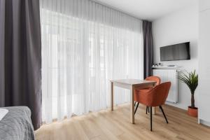 Stylowe Studio z Balkonem Blisko Rynku by Noclegi Renters