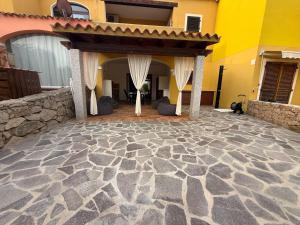 Confortevole Trilocale con ampio Patio, Residence Mirice - Vignola Mare