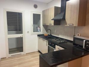 Appartement les oliviers , super équipé 5 minutes clinique soukra , 1chambre