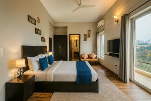 The Garnet Apartment With Balcony # Lift # Garden # Ac rooms # Private Parking # Near Prem Mandir # Located Inside- Omaxe Eternity Vrindavan #