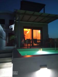 Dimis House